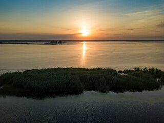 Naklejka premium Sunrise over the wide river Dnieper. Aerial drone view.