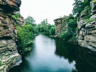 Fototapeta premium river in canyon high stone cliff