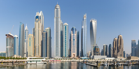 Fototapeta na wymiar Dubai Marina and Harbour skyline architecture travel in United Arab Emirates water reflection panorama