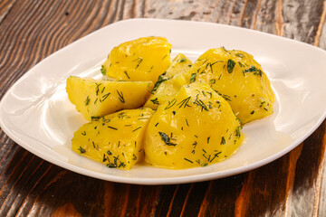 Boiled potato with dill and oil