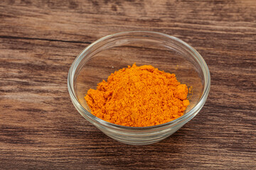 Tumeric powder in the bowl