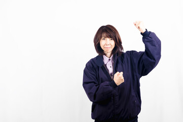 ガッツポーズの女性