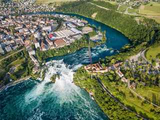 Neuhausen, Switzerland - June 26. 2021: Aerial photography with drone of Rhine Falls with Schloss...