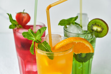 mix of three bright colored delicious cold lemonade