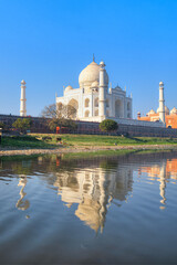 Fototapeta na wymiar Taj Mahal mausoleum reflected in Yamuna river - Agra, Uttar Pradesh, India