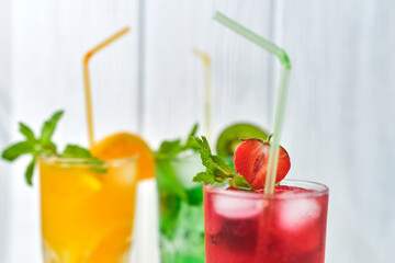 mix of three bright colored delicious cold lemonade
