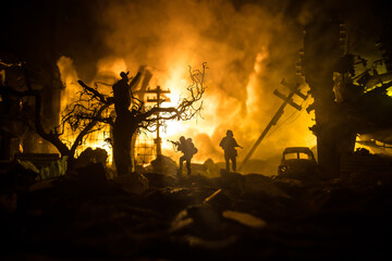 Fototapeta premium War Concept. Military silhouettes fighting scene on war fog sky background, World War Soldiers Silhouette Below Cloudy Skyline At night. Battle in ruined city