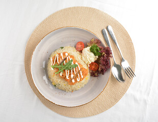 chef wok fried rice with crispy chicken chop cutlet and side salad asian halal menu