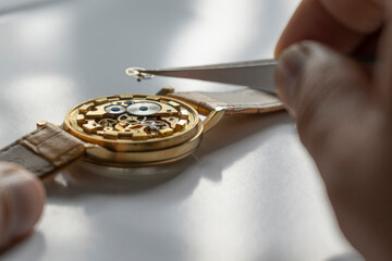 Watchmaker repair mechanical watches. Gears repair. Watch repair process