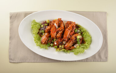 Fototapeta premium asan chef stir fried big tiger prawn in sweet mamak sauce nonya har lok asian halal menu