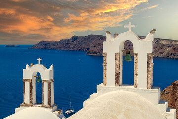 Architecture with churches of Oia on Santorini island, Greece