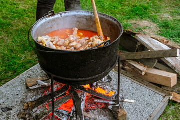 Romanian traditional food prepared at the cauldron on the open fire