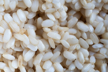 Uncooked white rice grains background