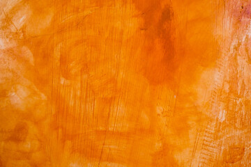 Textured wall brushed painted Background, Abstract Orange Oil Color.