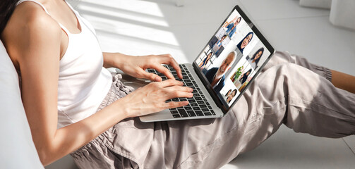 Woman talk speak using laptop computer working and video conference online meeting with colleagues at home.Creative woman talk video chat call with business team.work from home concept