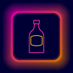 Glowing neon line Beer bottle icon isolated on black background. Colorful outline concept. Vector