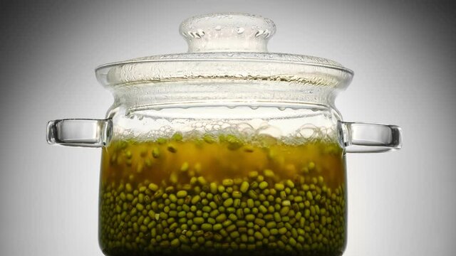 mung is cooked in glass pan. Timelapse of cooking healthy food
