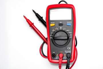 Electronic digital multimeter isolated on white with probes. Digital multimeter with red and black...