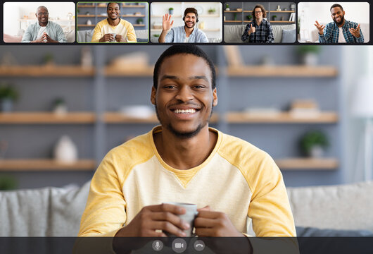 Smiling men making online videochat, screen view