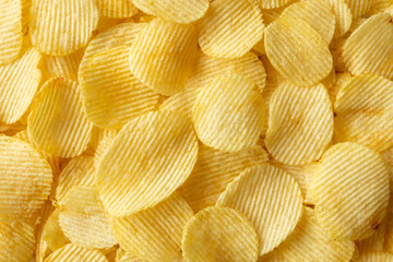 crispy golden potato chips snack texture background