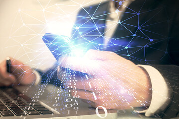 Multi exposure of man's hand holding and using a digital device and data theme drawing. Innovation concept.