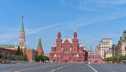 Nikolskaya Tower and the Historical Museum on Red Square. The ancient Moscow Kremlin is the main tourist attraction of the city. Beautiful panoramic view of the heart of Moscow on a sunny day.