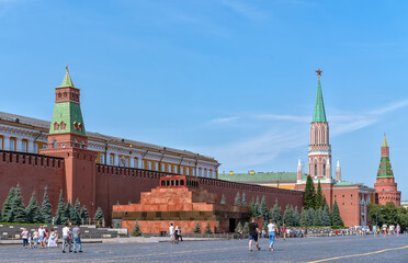 Senate Tower, Lenin's Mausoleum, Nikolskaya Tower on Red Square. The ancient Moscow Kremlin is the main tourist attraction of the city. Beautiful panoramic view of the heart of Moscow on a sunny day.