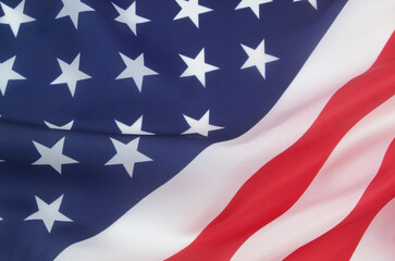 Waved USA flag background. Close up of United States flag as patriotic symbol.
