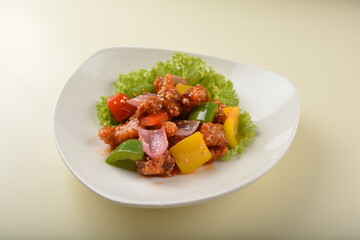 popular chef cook fried sweet and sour chicken with vegetables serve with steam white rice asian halal menu
