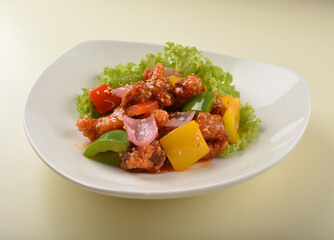 Fototapeta premium popular chef cook fried sweet and sour chicken with vegetables serve with steam white rice asian halal menu