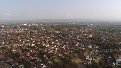 cityscape Yogyakarta with buildings, highway at sunset time. aerial view cultural capital Indonesia yogyakarta located on java island, Indonesia