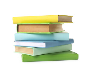 Many colorful hardcover books on white background