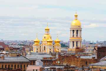 Fototapeta na wymiar Russian Orthodox Church The St. Prince Vladimir Cathedral in Saint Petersburg, Russia. Beautiful top view of the historical center, roofs of Saint Petersburg