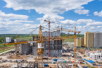 construction of a new house. a concrete multi-storey building in a residential complex.