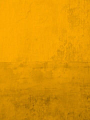 Stucco wall painting gold yellow. Background modern textured rusty wallpaper.