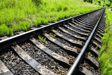 railway tracks on which trains run on a summer day. travel and transportation