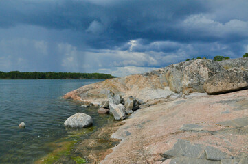 Rain clouds over a glaciated rock