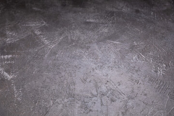 Naklejka premium Abstract painted background texture as table top. Plaster surface