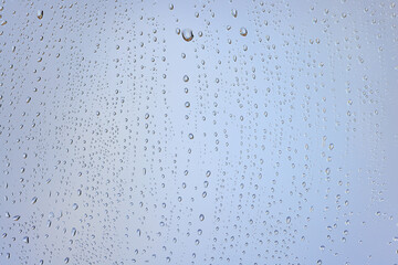 drops glass blue background abstract, transparent cold background water splashes