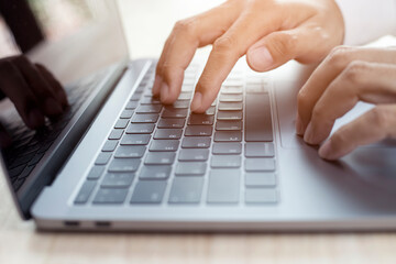 Hands of business people working remotely at home, Man typing on laptop or computer