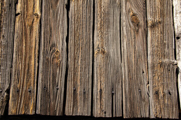 Background with a texture of old brushed boards with a clear pattern of fibers.