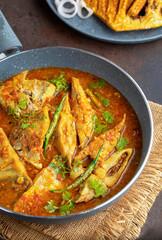 Pomfret Fish, Indian cuisine, rustic setup 