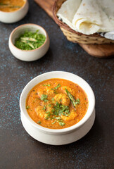 Prawns, Indian cuisine, dark background, rustic setup 