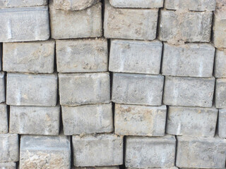 A stack of dirty gray bricks