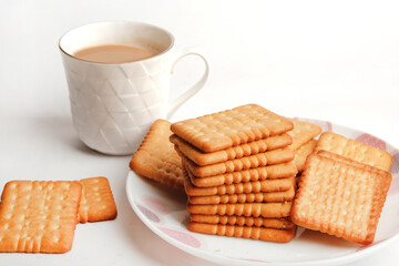 Morning Cup of tea and biscuits Indian. chai or chaha in india. Tea Time. - obrazy, fototapety, plakaty