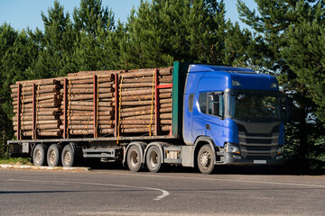 Truck with timber logs