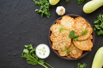 A healthy breakfast of zucchini pancakes. Creative atmospheric decoration