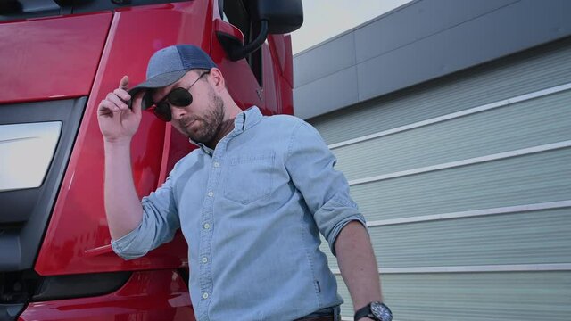 June 6, 2021. Krakow, Lesser Poland. Red Semi Truck Driver