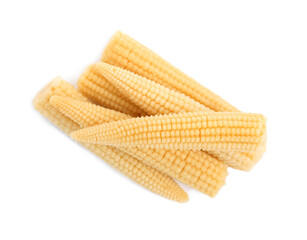 Fresh baby corn cobs on white background, top view