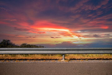 Ocean side highway and Gard rail, behind is beautiful mountain view and blue sky. Road side view...
